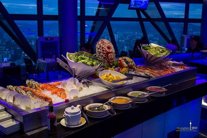 Dine-in at Orbit Revolving restaurant Kuala Lumpur(with transfer) - What Happens at KL Tower