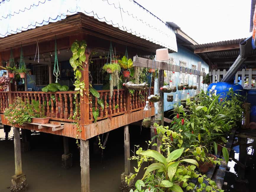From Sandakan: 7 Unmissable Local Stops Private Tour - The floating village and life over the water