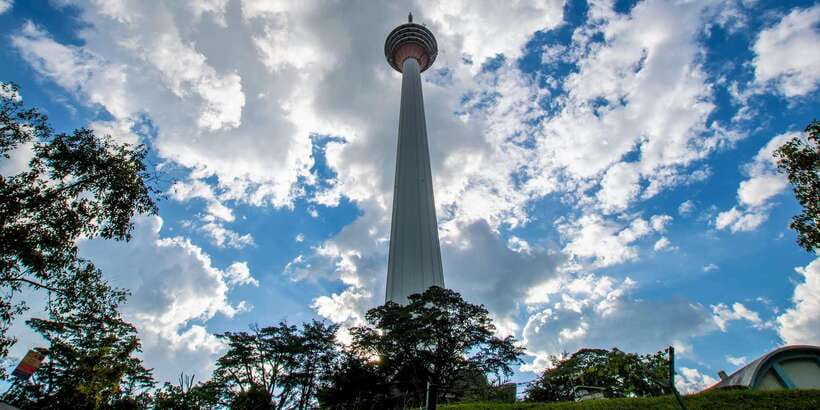 Kuala Lumpur City Tour with KL Tower Ticket - What the guide adds to the ride