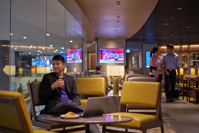 Kuala Lumpur International Airport Plaza Premium Lounge - Seating, runway views, and the working corner