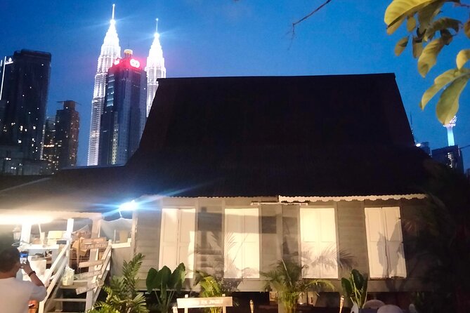 Kuala Lumpur Sunset Evening Cycling Tour - Saloma Link, glowing between two sides of KL