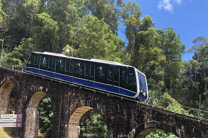 Penang Full Day Tour with Penang Hill, Kek Lok Si & Fruit Farm - Kek Lok Si shows Penang’s layered religious culture