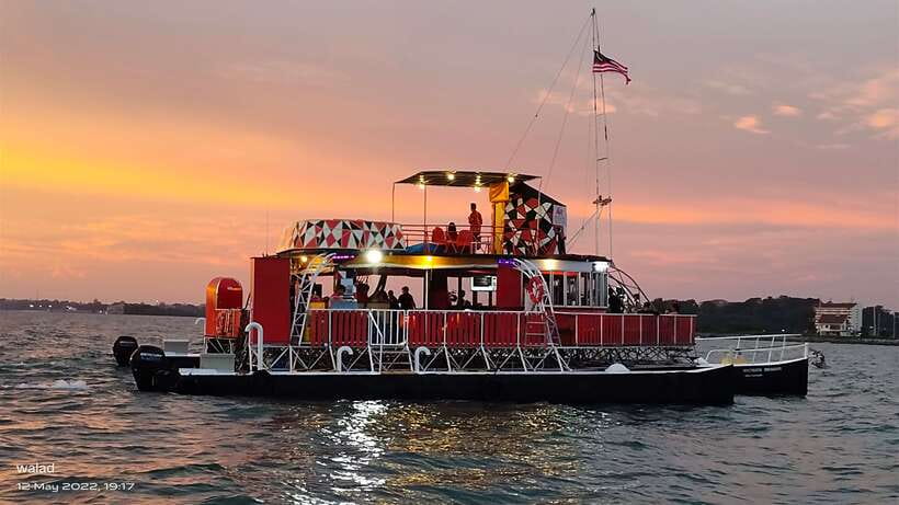 Port Dickson: Breathtaking Dickson Dragon Sunset Cruise - A party yacht with a Port Dickson sunset