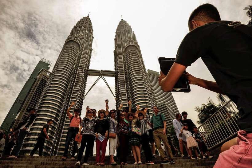 Private KL City Tour with Petronas Twin Towers & Batu Caves - Petronas Twin Towers: the day’s big skyline moment