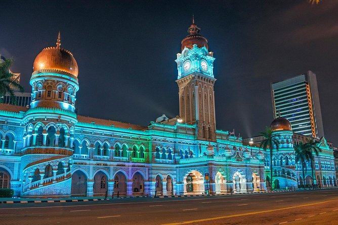 Private Kuala Lumpur City Tour With Petronas Tower & Local Dinner - Dinner and dance at Wow KL Theatre